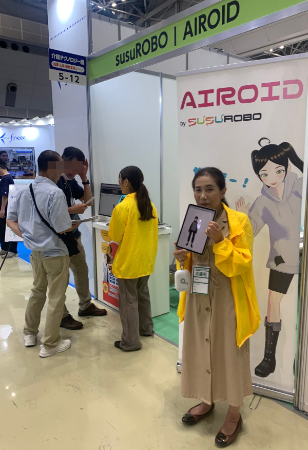 The AI companion at CareTex 2025 — susuROBO team demonstrating the avatar