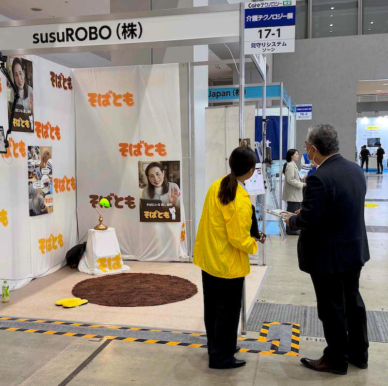 Visitor interacting with Sobatomo at CareTex 2026