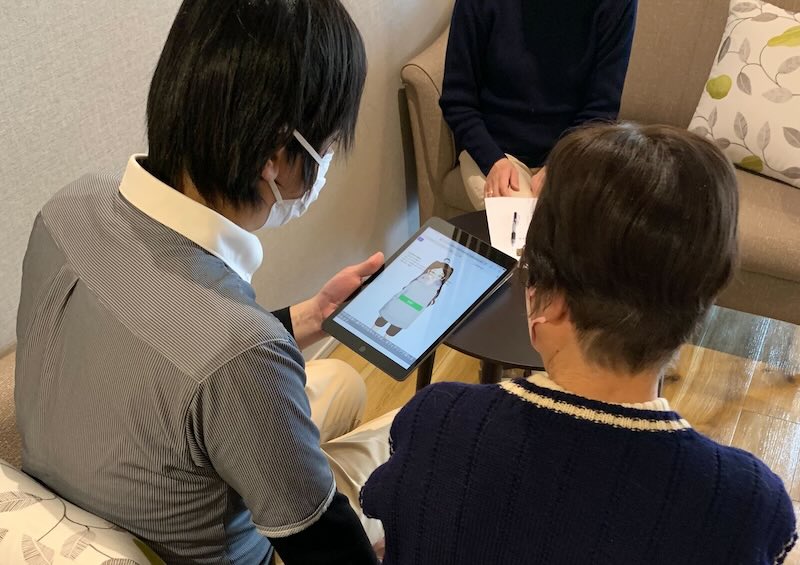 Resident trying the avatar companion at Wellis Olive Senrioka